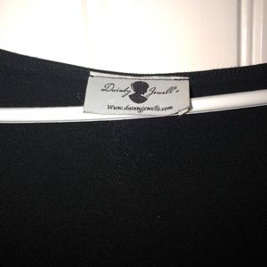 Dainty Jewell’s Black Dress